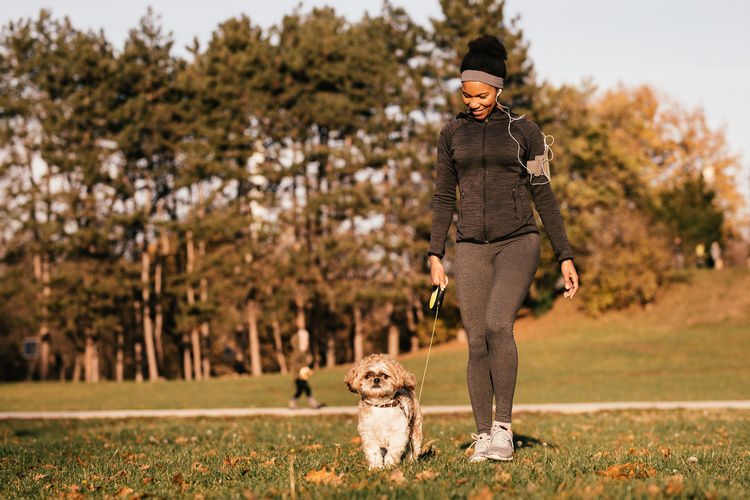 Woman walking her dog | Blog | Greystar 